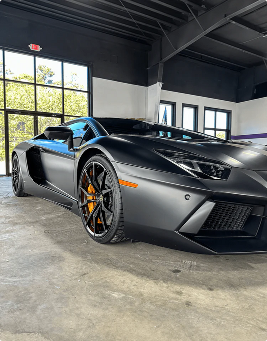 Luxury car with ceramic coating, PPF film, and window tinting - Sigma Kore